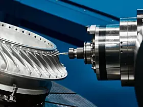 Producing turbine wheel part with five-axis lathe machine