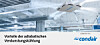 Industriehalle mit Deckenrohren und Condair-Banner zur adiabatischen Verdunstungskühlung.